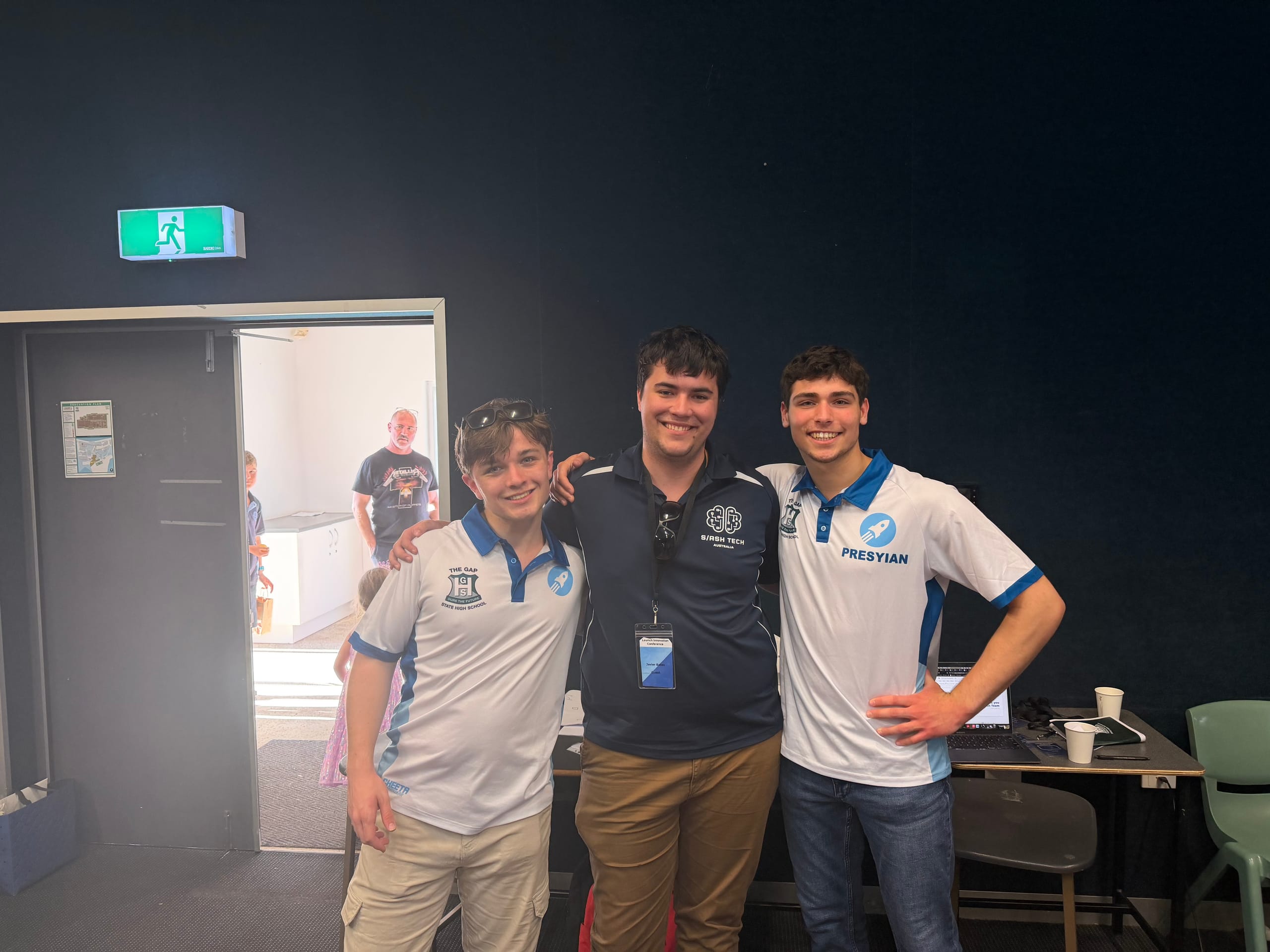 Javier with two student leaders at an innovation conference